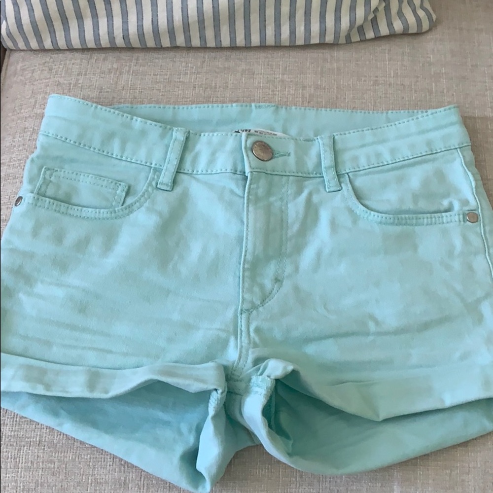 mint colored jean shorts